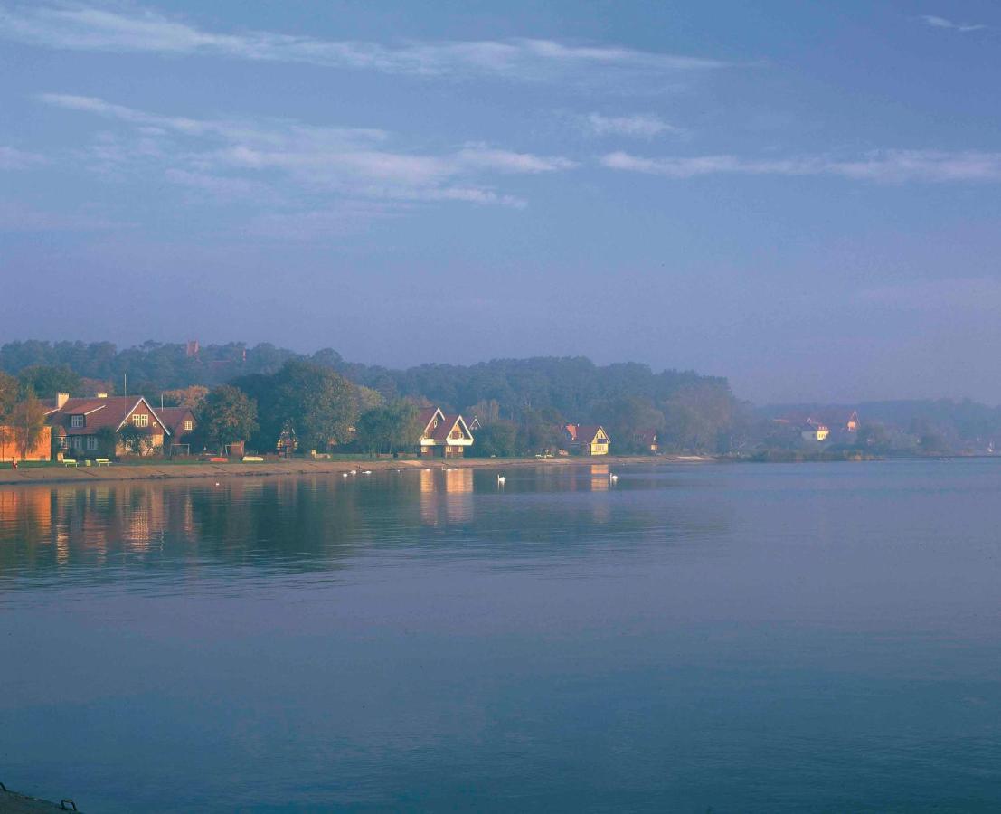Aika Hotel Nida Bagian luar foto